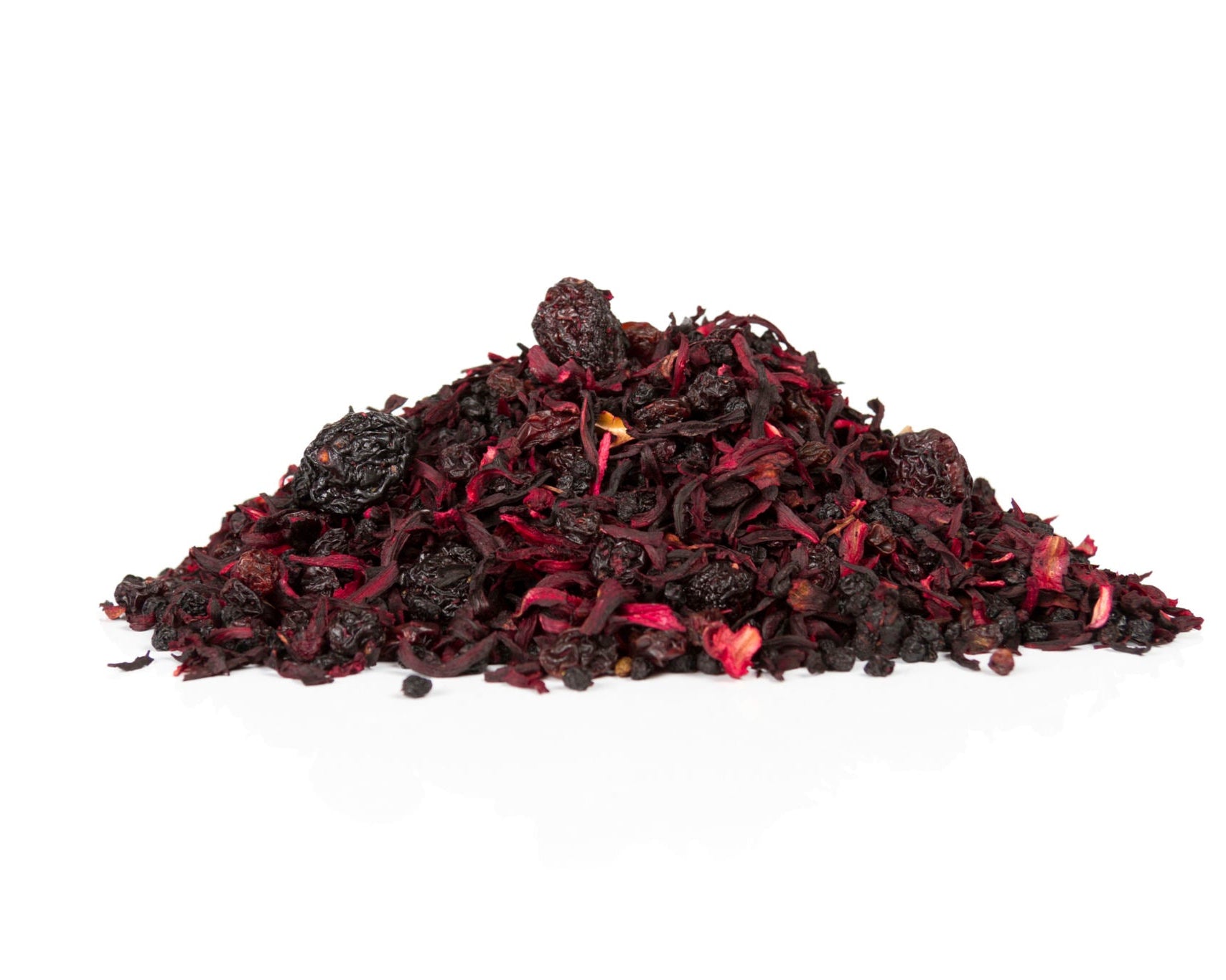 Pile of dried hibiscus flowers on a white background